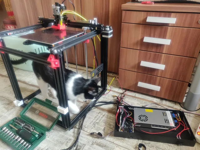 Heavily modified Ender 5 mid-build, control board and power supply still on the floor
