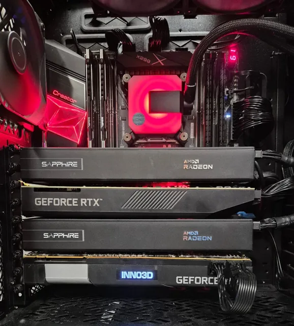 Inside the homelab server: two Sapphire Radeon cards and two GeForce cards stacked in one case under a water-cooled CPU